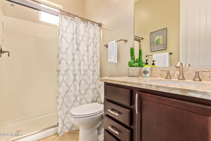 suite full bathroom with walk-in shower