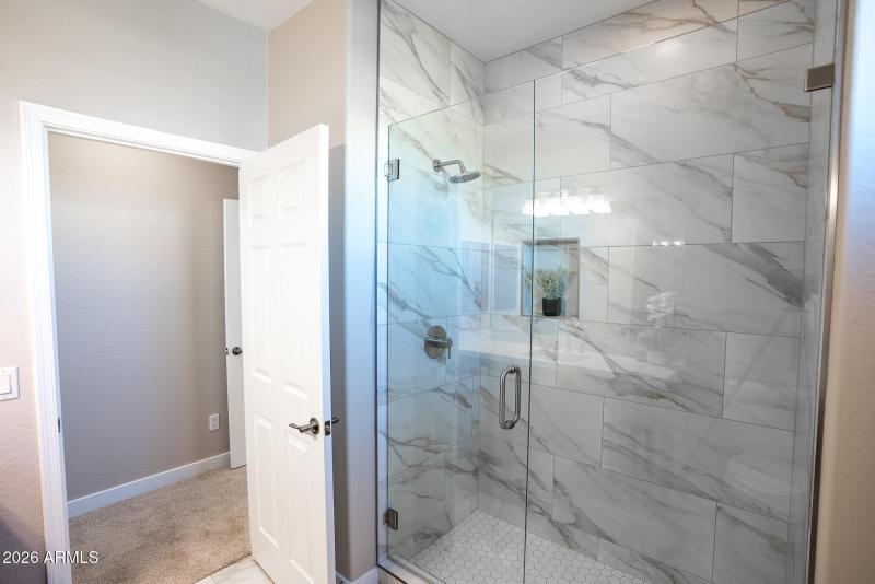 brand new tiles shower and glass door