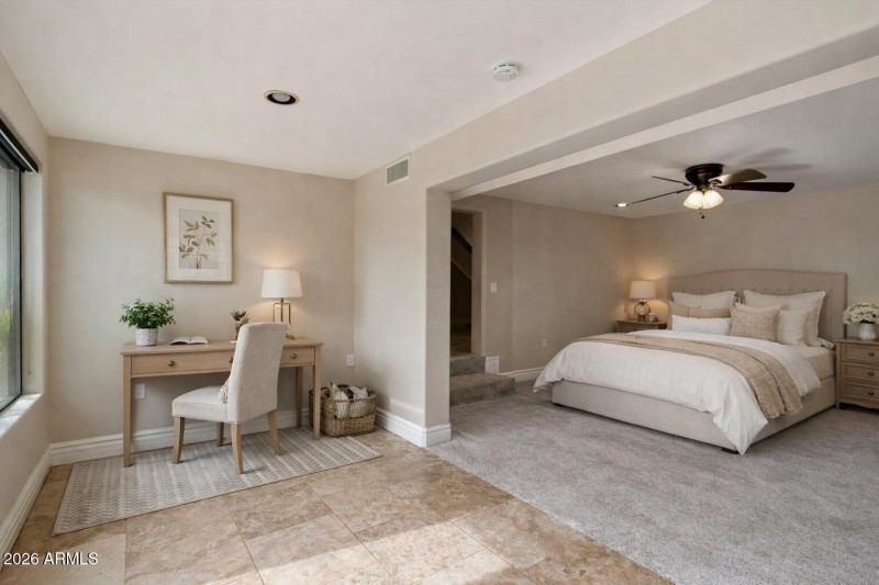 Virtually staged guest bedroom 1 with pr