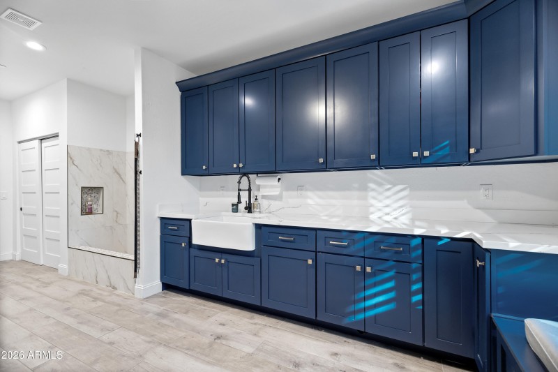 Laundry with farmhouse sink