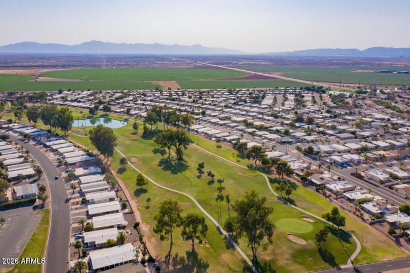 Golf course and lake with drone