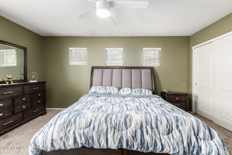 Primary bedroom with side closet