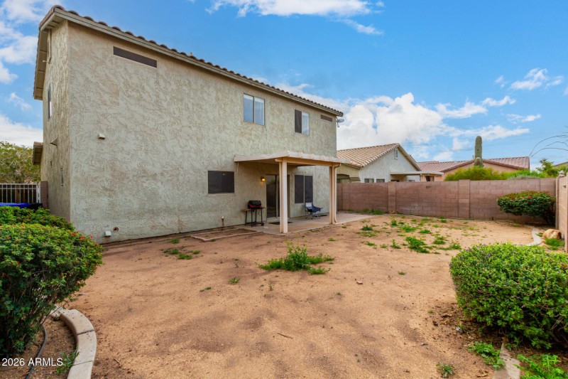 Backyard with covered patio