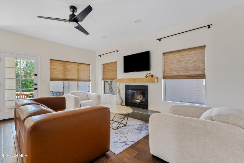 Fireplace and door to backyard