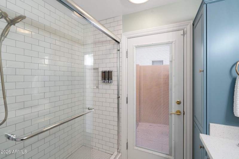 Primary Shower and Exit to Backyard