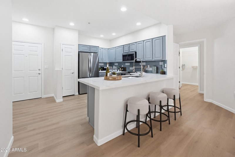 Kitchen Island Offers Seating for Three.