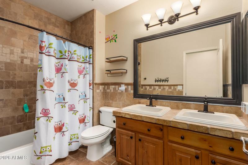 Two sinks in basement bathroom