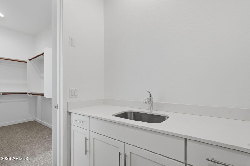 Inside Laundry w/Primary Suite Access