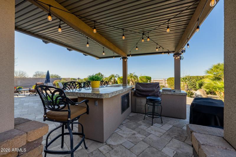 Gazebo with bar seating and BBQ area