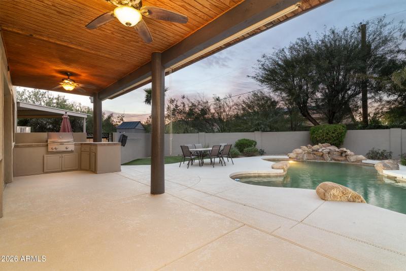 Large covered patio with built in BBQ