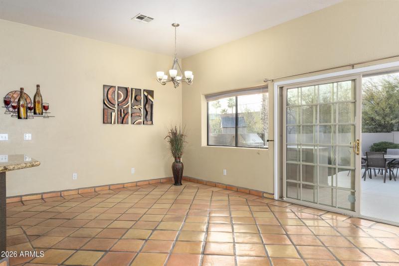 Dinning area out to backyard