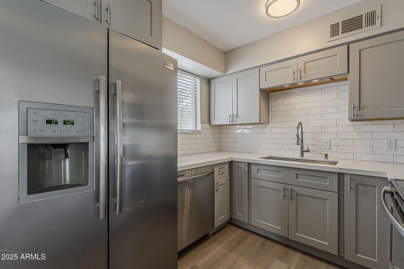 Bright Kitchen With Stainless Appliances