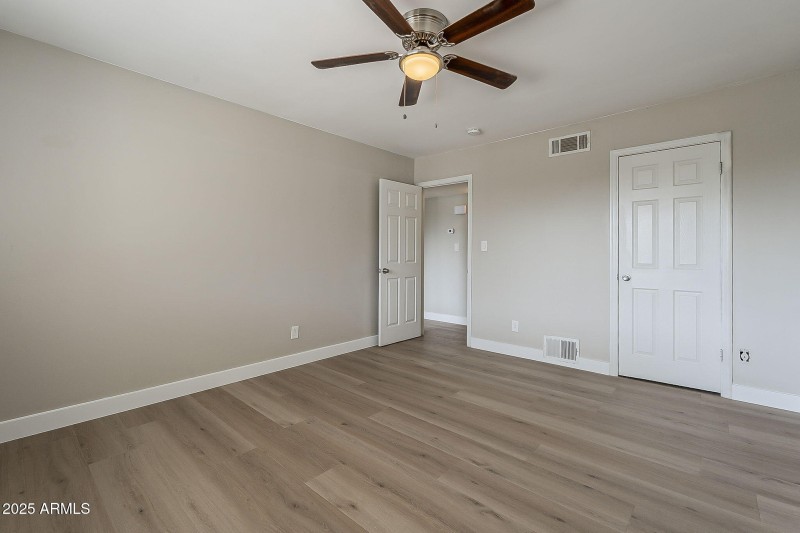Spacious Bedroom with Ceiling Fan