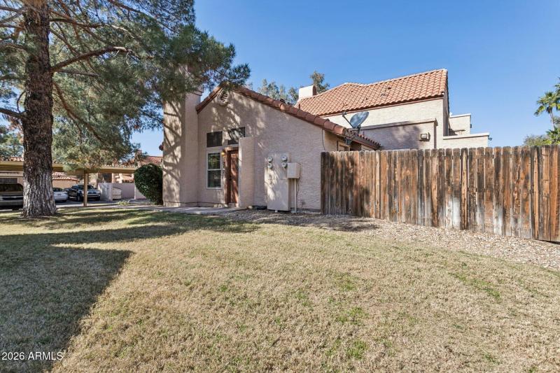 Exterior and Fenced Back Yard