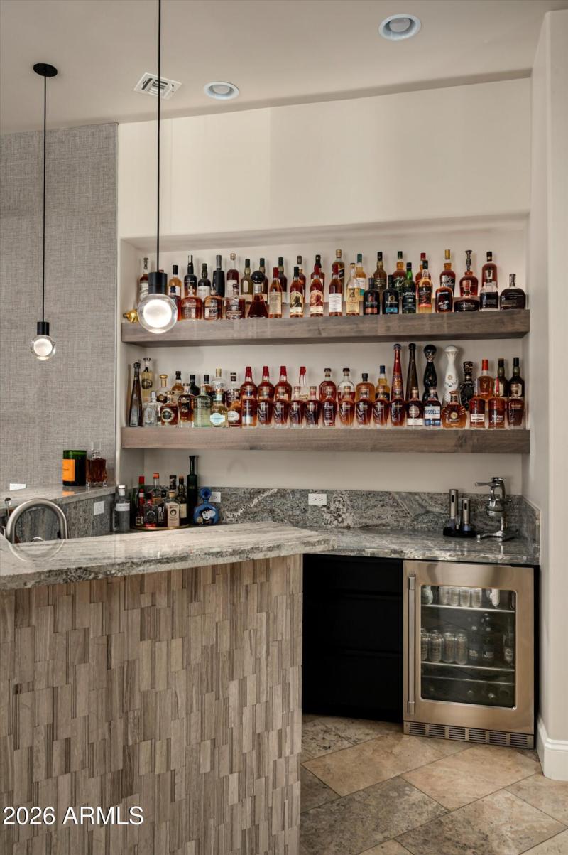 Wet bar with sink and refrigeration