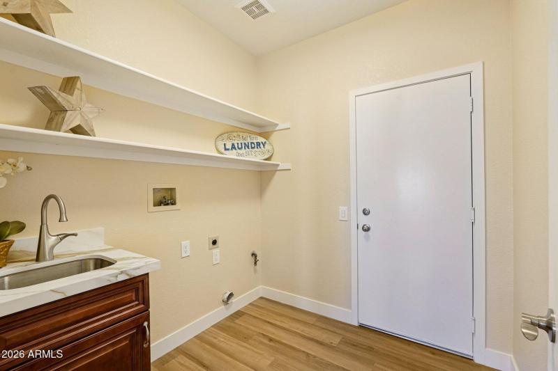 Laundry Room with Sink & Cabinets