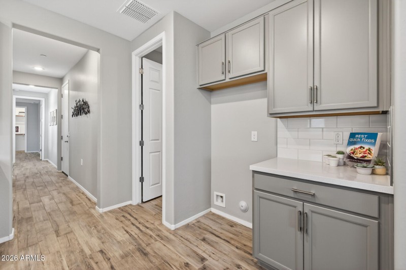 Kitchen towards Laundry/Hall