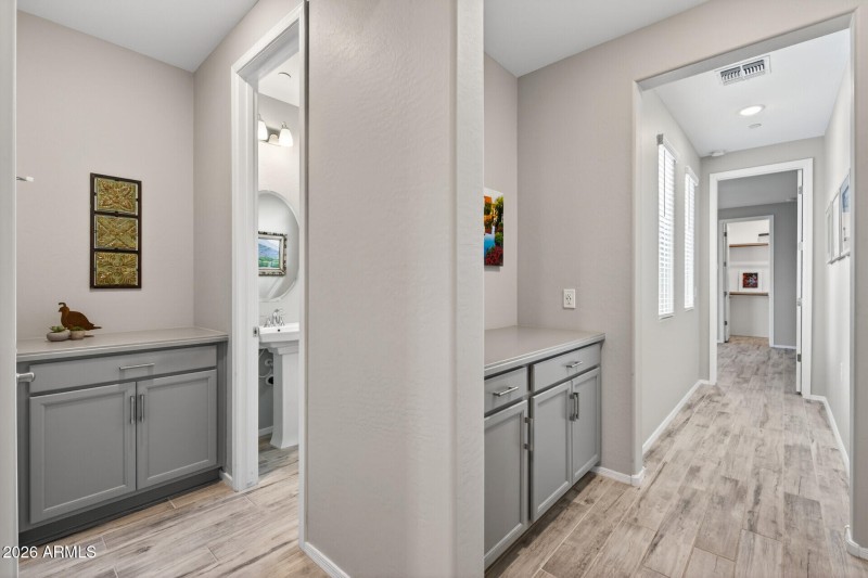 Key Drops off Hallway towards 1/2 bath