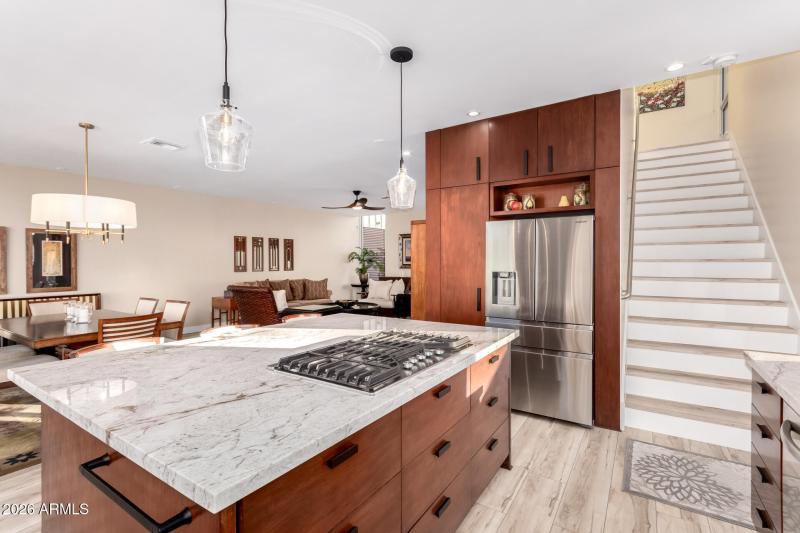Kitchen & Large stairwell to 2nd flr
