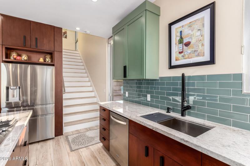 Kitchen & Large stairwell to upstairs