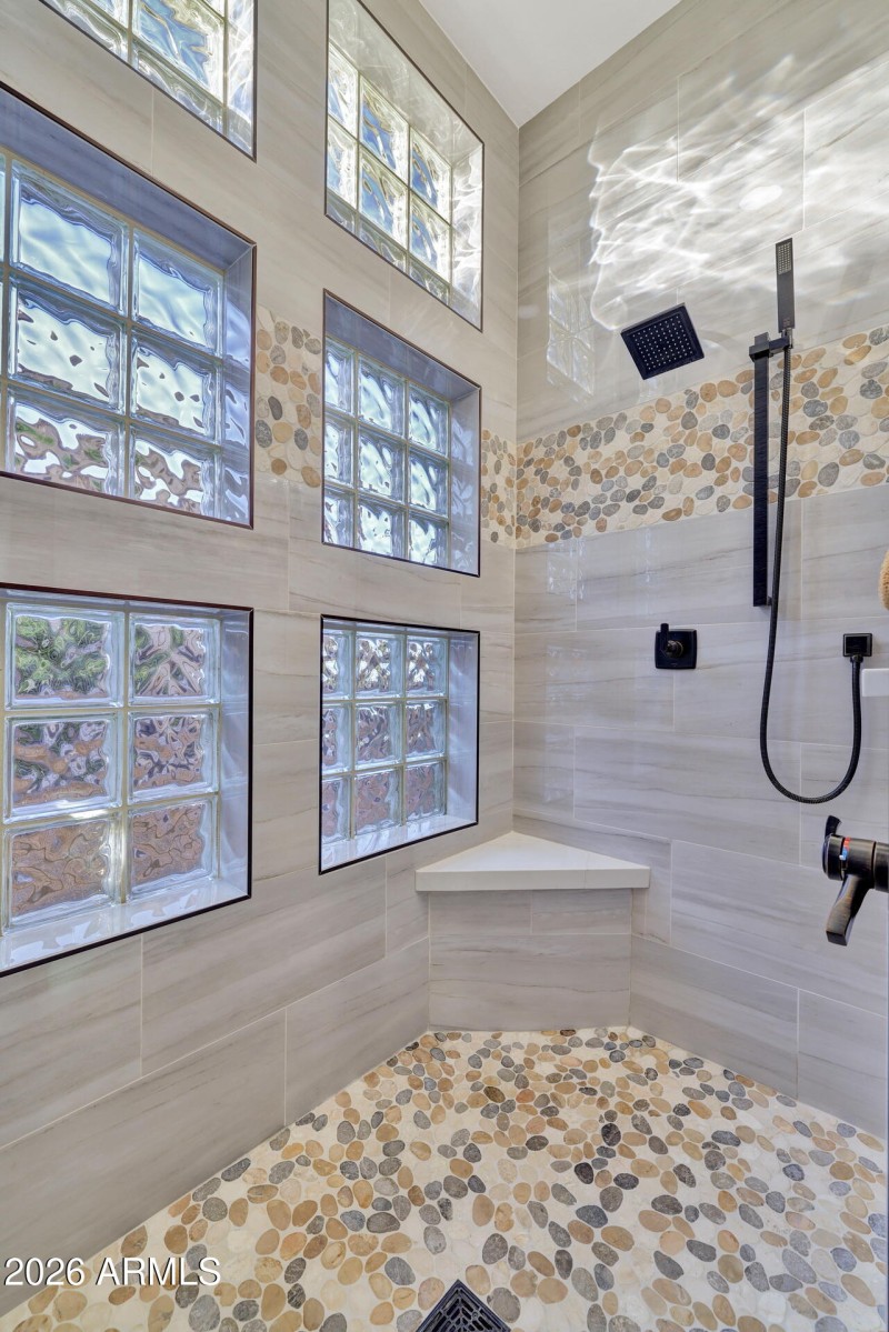 Beautifully tiled doorless Shower