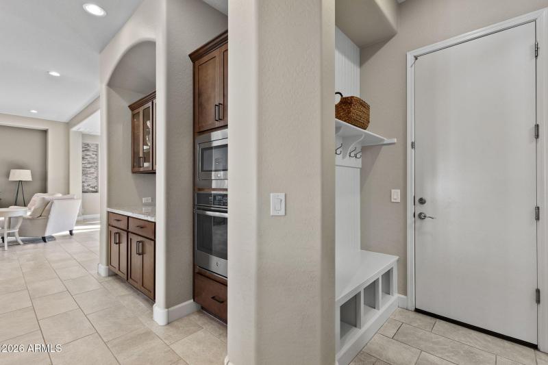 Drop zone at entry from garage