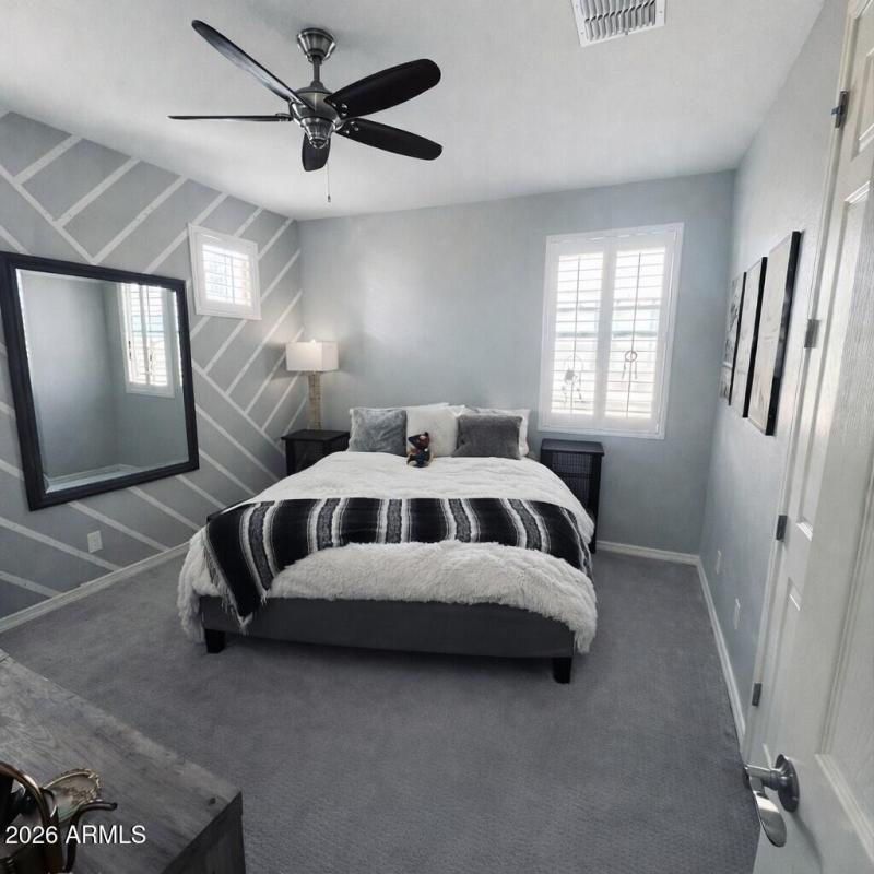 Contemporary bedroom with Mario plush to