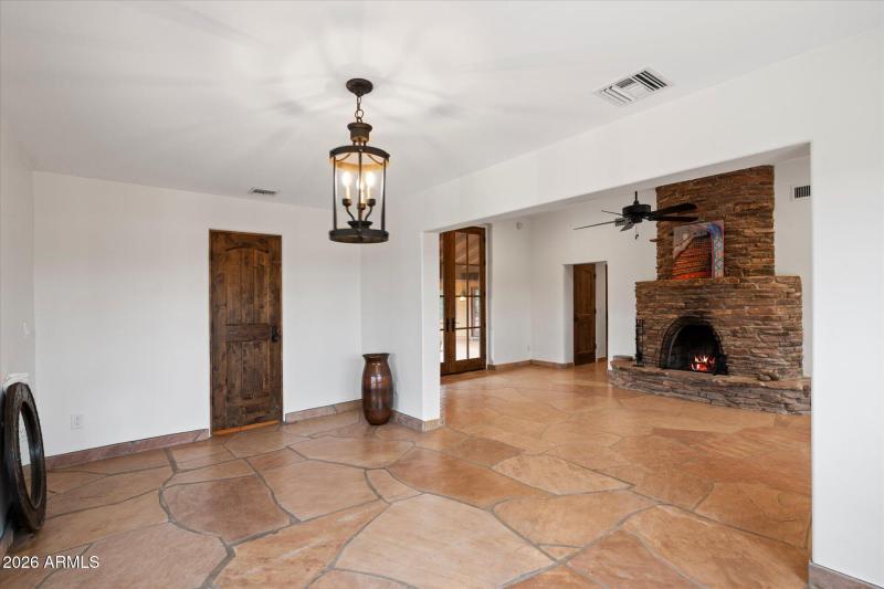 Spacious Living Area w Cantera Fireplace
