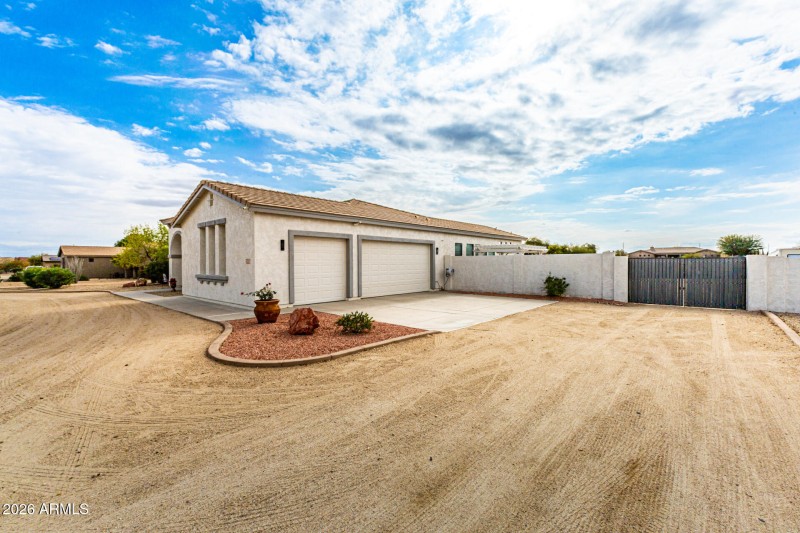 3 CAR GARAGE / RV GATE