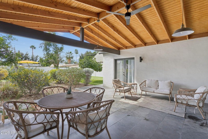 Expansive covered patio in rear yard