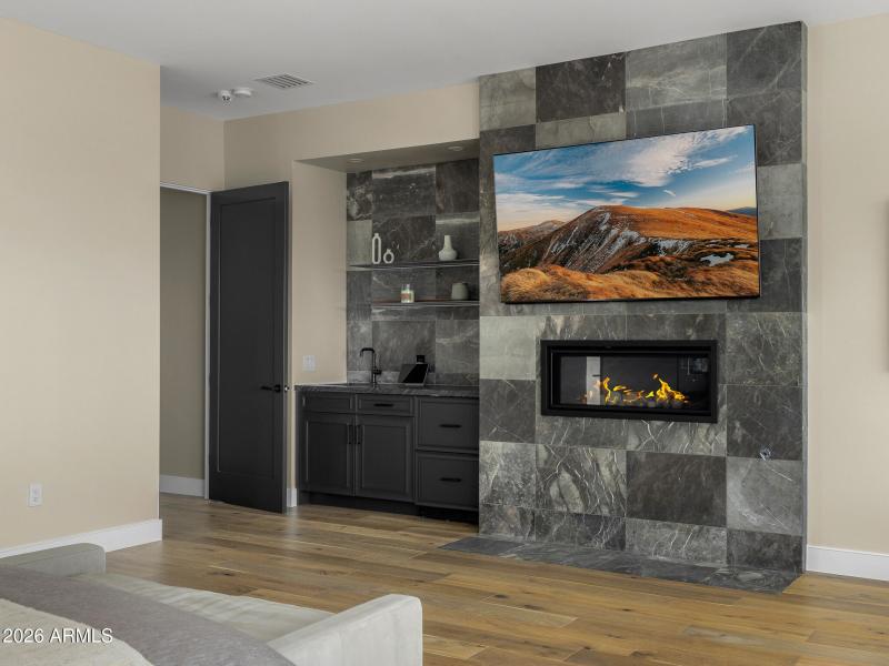 34primary bedroom fireplace and breakfas