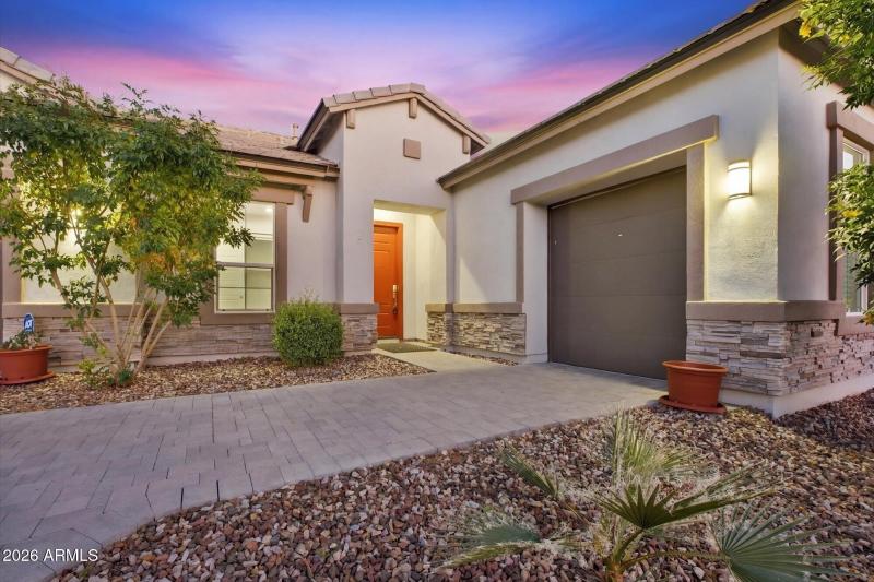 Stone Accents & Inviting Front Courtyard