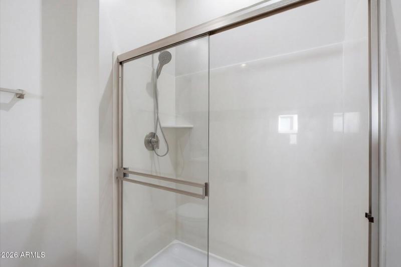 Glass Shower w Neutral Tile