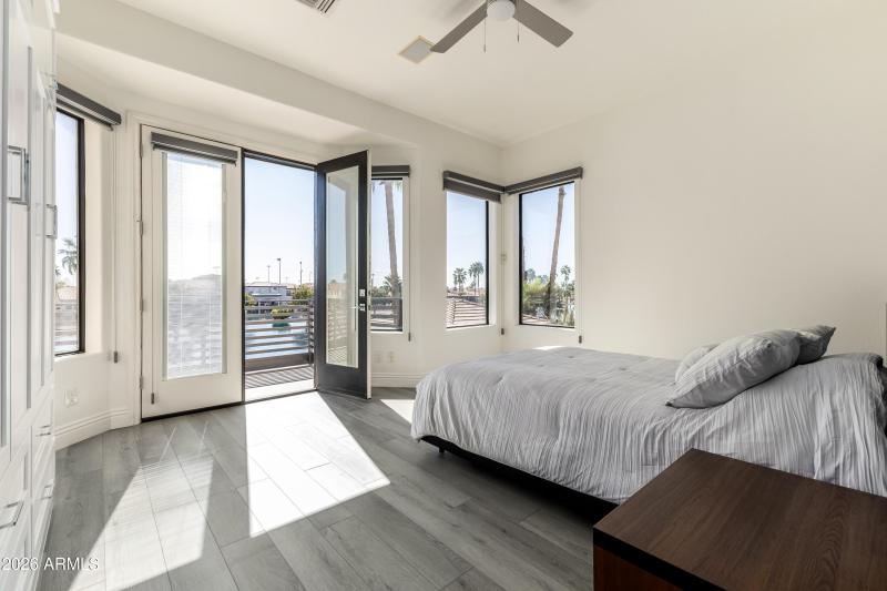 Upstairs bedroom with balcony