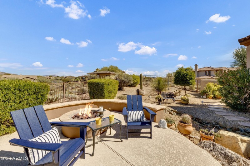 View of firepit are adjacent to the pool