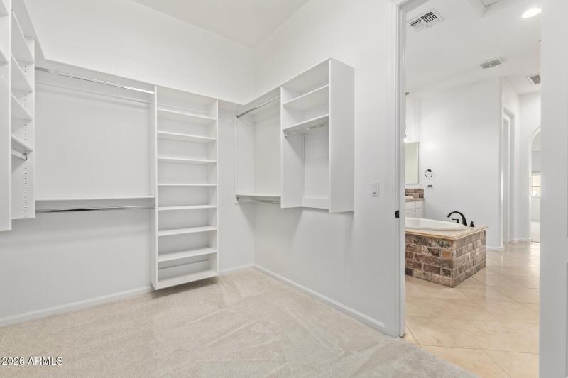 Primary bdrm closet- spacious!