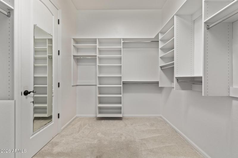 Primary bdrm closet- custom shelving!