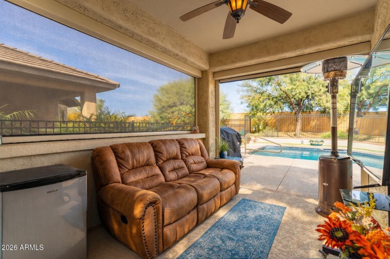 Sunny patio with pool view