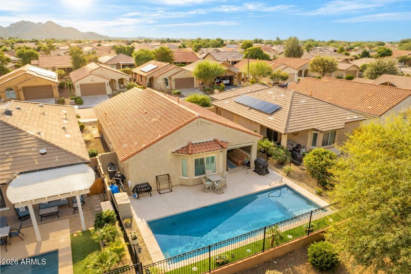 Suburban neighborhood with pool and pati