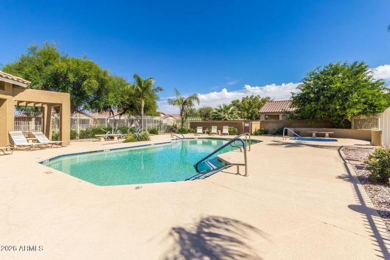 Community pool area with spa