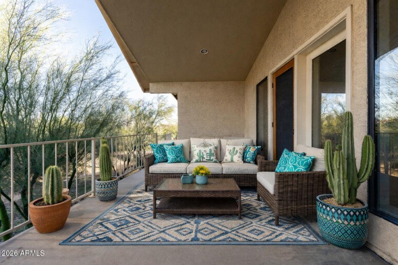 Desert patio with woven rattan furniture