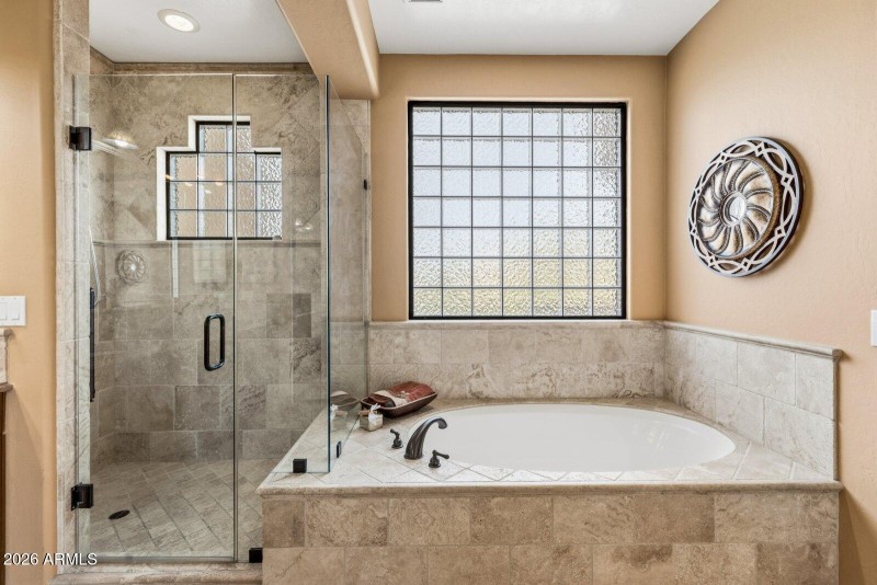 27 - Primary Tub and Shower with Travert