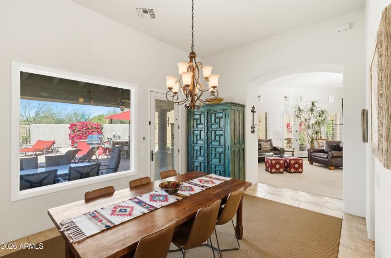 Formal dining w/ pool views