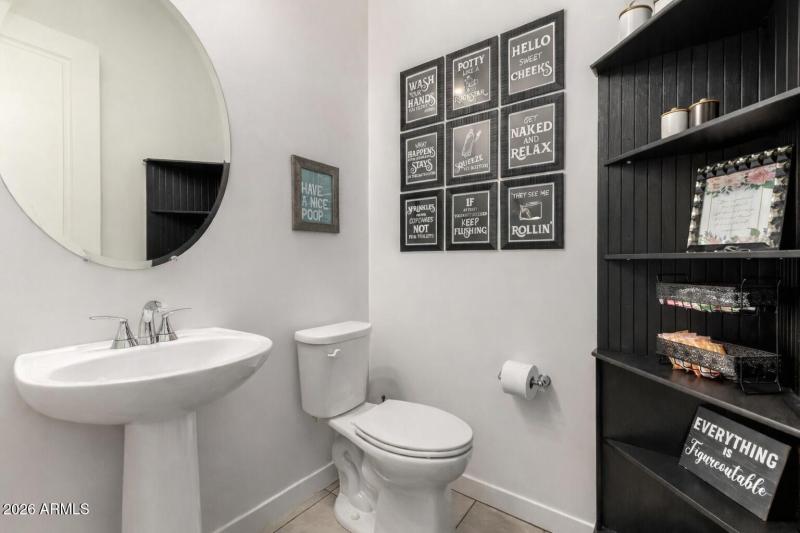 Fun bathroom decor with humorous phrases