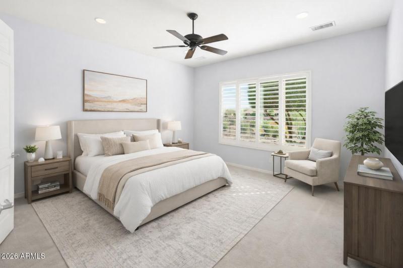 Serene blue-gray bedroom with cozy accen