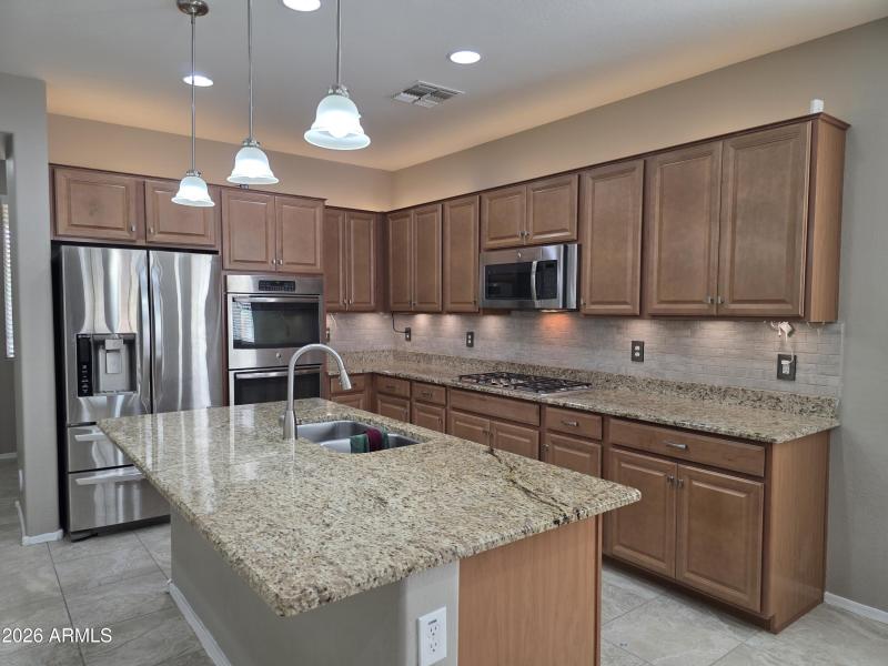 Spacious Kitchen with Island Sink