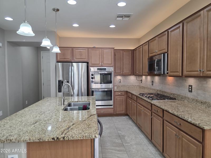 Open Kitchen with Granite Island