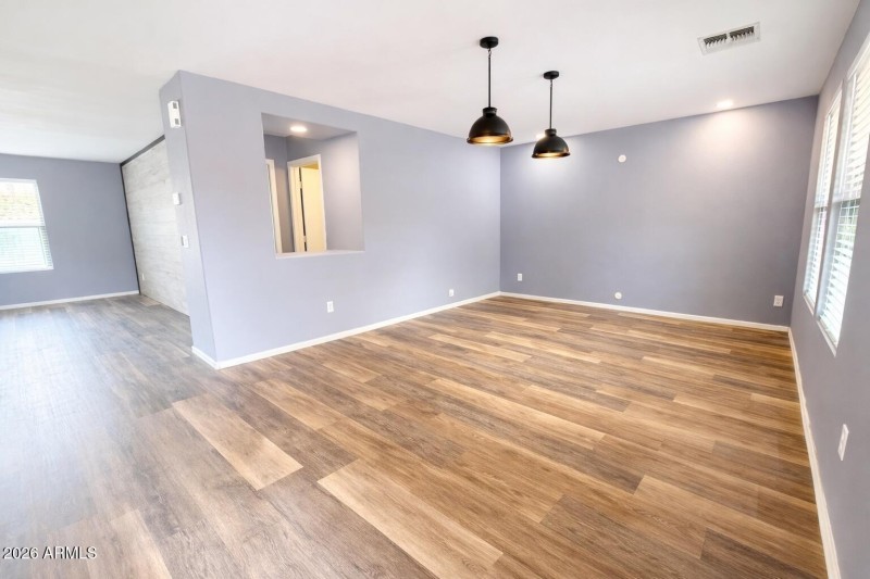 Living room space with pendant lights