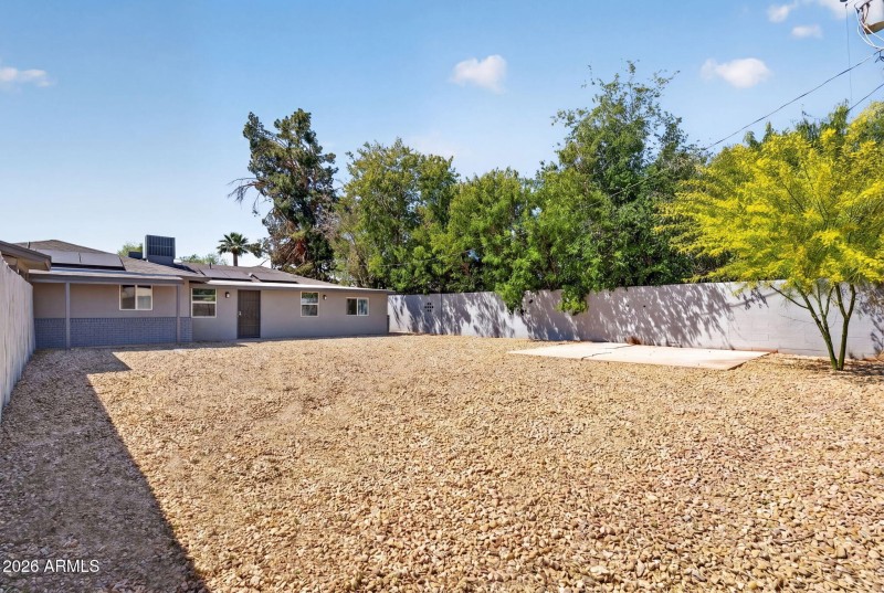 Spacious Backyard with Gravel