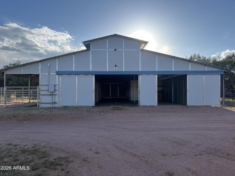 Outside barn with doors open